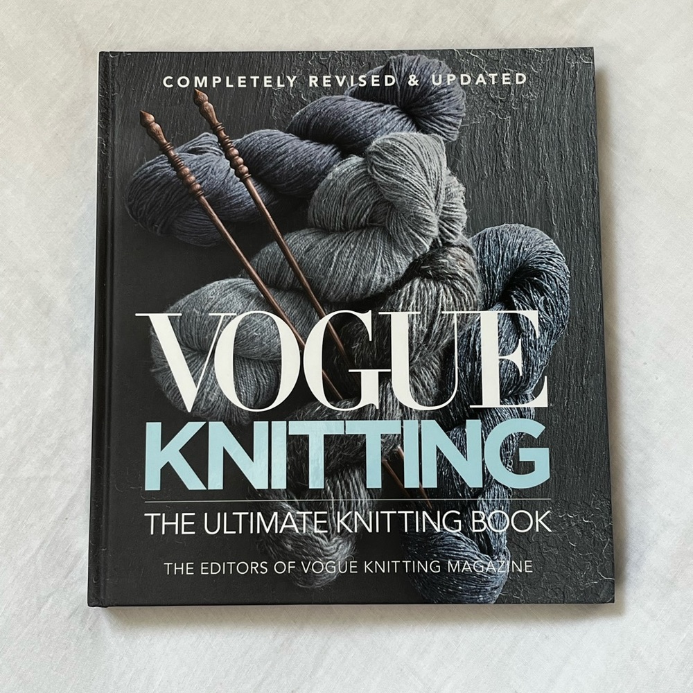 Vogue Knitting Book with Gray Yarn and Light Blue Title
